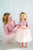 Vienādu kleitu komplekts mammai un meitai ''Milēna'' ar rozā krāsas fliteriem un rozā tilla svārku daļu