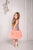 Rozā fliteru kleita, midi garuma, taisnā piegriezuma un kuplu tilla apakšējo svārku daļu ''Karolīna'' meitenēm