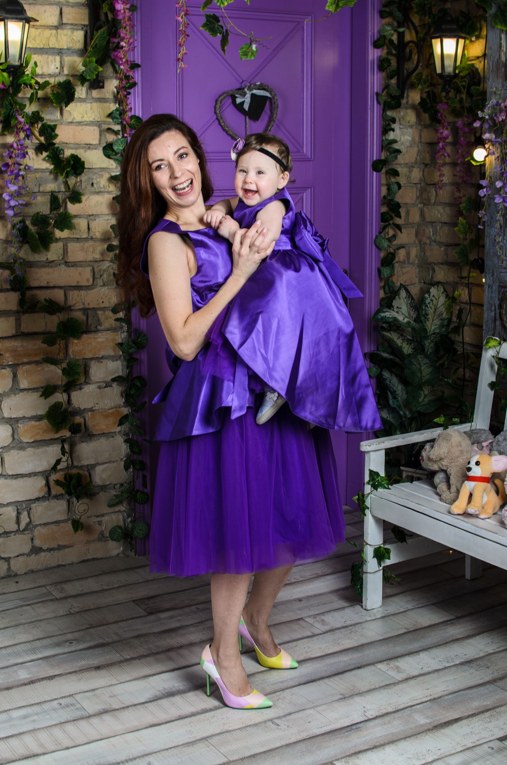Purple Evening Dress For Mom And Daughter Beautiful Mother Daughter Luxurious Purple Dress Stock Photo Purple Evening Dress For Mom And Daughter Beautiful Mother Daughter Luxurious Purple Dress Stock Photo
