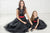 Long dresses with black sequins and red bows 