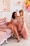 Powder pink, asymmetrical dresses for mother and daughter 