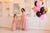 Powder pink, asymmetrical dresses for mother and daughter 