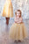 Gold colored tulle dresses without sleeves 