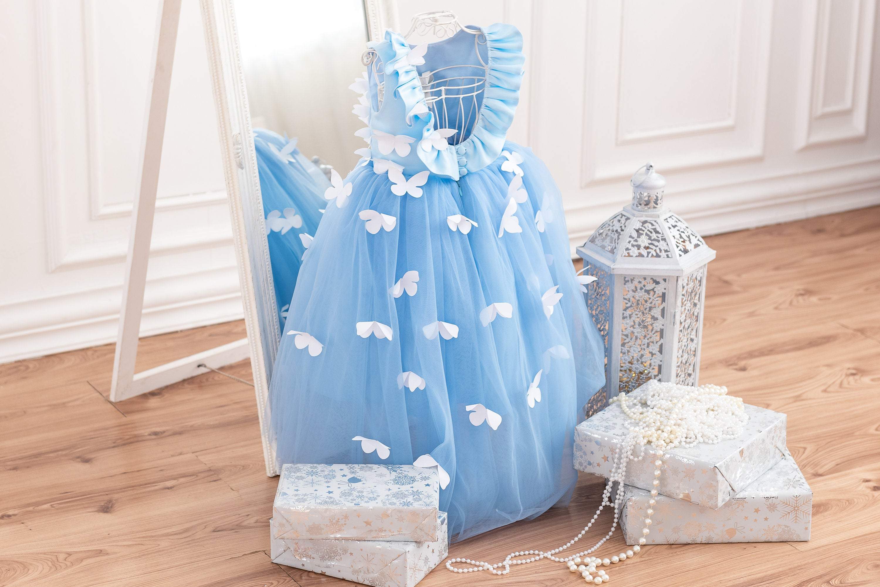 Light blue dress with white butterflies Light blue dress with white butterflies