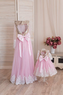 A set of identical dresses for mother and daughter 